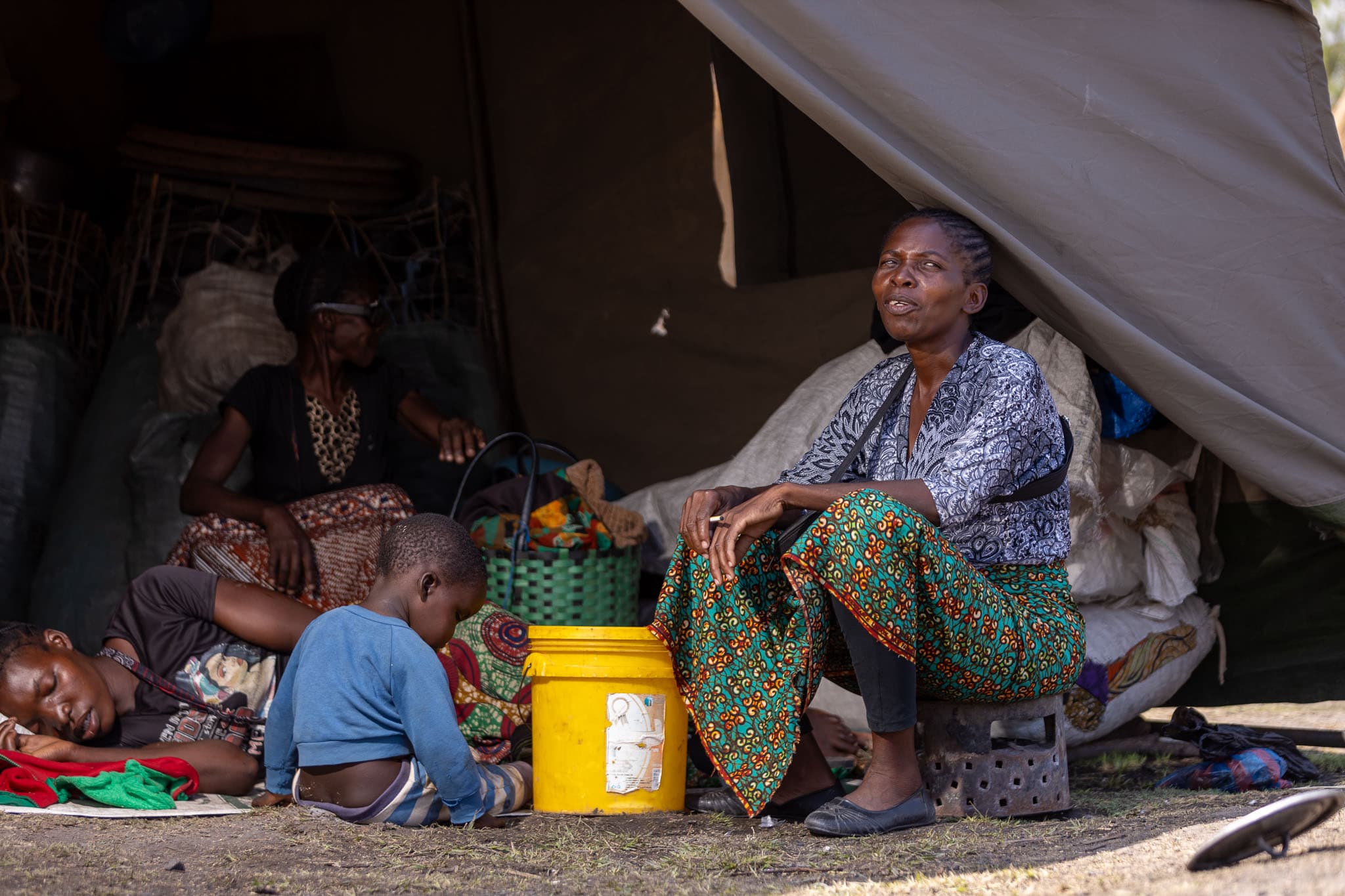 A Project Concern Zambia case worker visiting a family at their home
